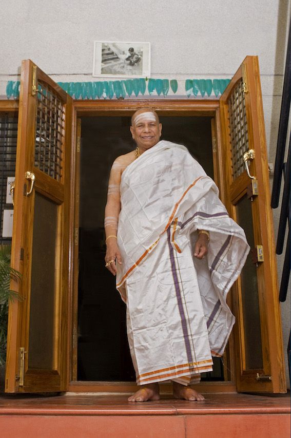 K. Pattabhi Jois in later life, seated in white